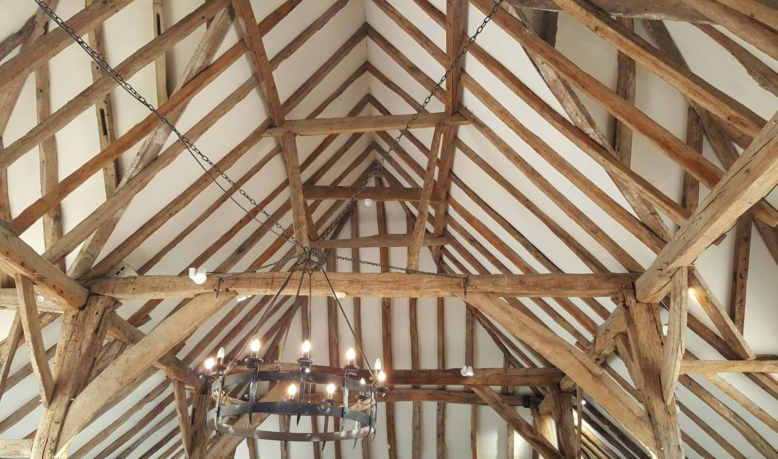 Exposed roof timbers inside a building being converted into homes