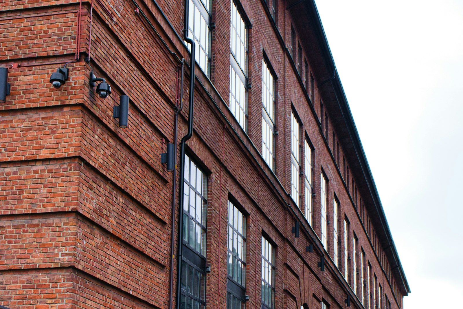 Converted warehouse apartment with large industrial windows